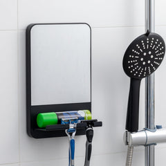 TAILI fogless shower mirror suction mount provides fog-free shaving visibility.