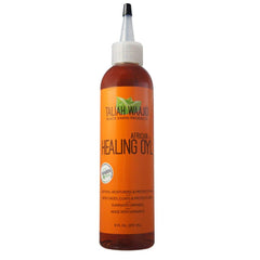 Taliah Waajid Black Earth African Healing Oyl bottle pour for hair and skin moisture.