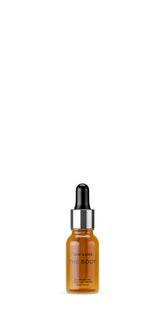 Tan-Luxe The Body Drops bottle close-up showing customizable glow