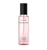 TAN-LUXE Express Water bottle close-up showing hydrating formula for a dewy glow.