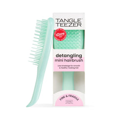 Tangle Teezer Fine & Fragile mint detangler closeup of soft-flex teeth for delicate detangling.