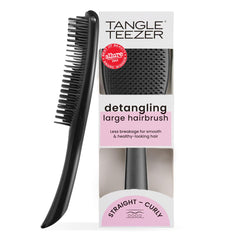 Tangle Teezer Large Ultimate Detangler black gloss paddle eases long-hair detangling.