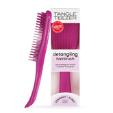 Tangle Teezer Ultimate Detangler electric raspberry glides through hair for easy detangling