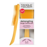 Tangle Teezer Ultimate Detangler with yellow daffodil handle easing detangling for long, thick hair