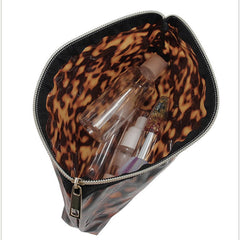 Tarvione tortoise purse zipper closure keeps cosmetics secure while commuting.