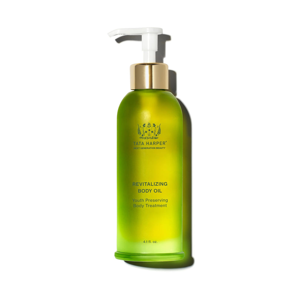 Tata Harper Revitalizing Body Oil bottle close-up highlights premium packaging and skin-nourishing formula.