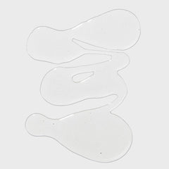 Tea Tree defining gel texture swatch reveals lightweight hold for defined curls.