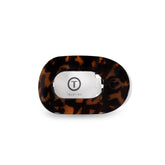 Teleties flat round clip lying-down demonstrates comfortable, no-slip hold ideal for lounging.