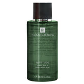 TEMPLESPA Quietude Mist bottle releases a calming scent for unwinding routines.