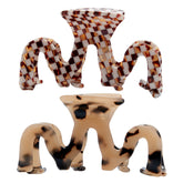 Textention Large Tortoise Shell Claw Clip close-up with secure grip for all-day styles