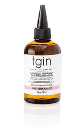 Thank God It's Natural tgin Miracle RepaiRx serum bottle pour for smooth, hydrated curls