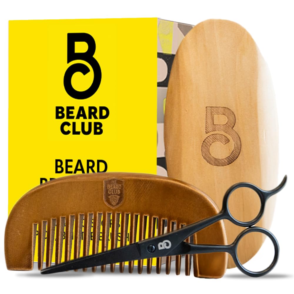 The Beard Club boar-bristle brush evenly distributes oil and detangles for a smoother beard.
