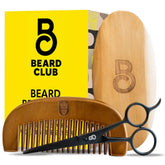 The Beard Club boar-bristle brush evenly distributes oil and detangles for a smoother beard.