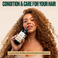 The Body Shop Ginger Scalp Care Conditioner packaging emphasizes sustainable materials and recycled plastic.