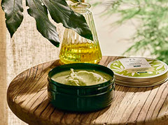 The Body Shop Hemp Body Moisturizer texture close-up reveals rich, nourishing cream.