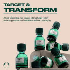 The Body Shop Tea Tree Oil being applied to a blemish for purifying effect