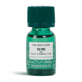 The Body Shop Tea Tree Oil bottle shows portable blemish-targeting care for on-the-go skin.