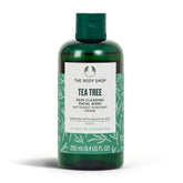 The Body Shop Tea Tree Skin Clearing Facial Wash bottle close-up, promoting balanced, clear-looking skin.
