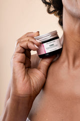 The Body Shop Vitamin E Intense Moisturizer label on jar highlights vegan formula.