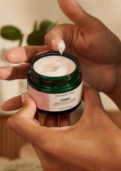 The Body Shop Vitamin E Moisture Cream texture swatch demonstrates fast-absorbing cream.