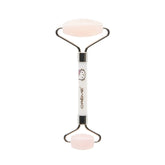 The Crème Shop Hello Kitty Love Quartz Roller, closeup on face, boosts absorption and radiant skin.