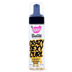The Doux Curl Cream bottle showing lightweight hold for soft defined curls