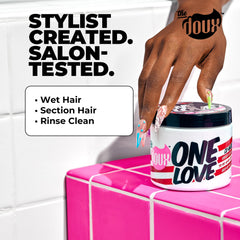 The Doux ONE LOVE co-wash ingredients jar shows jojoba and grapeseed oils for hydration.