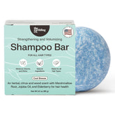 The Earthling Co. shampoo bar lather close-up highlighting luxurious cleansing and moisturized hair.