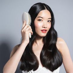 The Hair Edit Cream Finish and Shine brush close-up shows boar bristles distributing moisture for shine