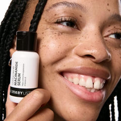 The INKEY List Niacinamide Serum in hand demonstrates quick absorption and hydration.