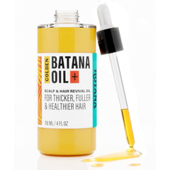 The-Mix-Up Golden Batana Oil bottle close-up showing a nourishing formula for hair health.