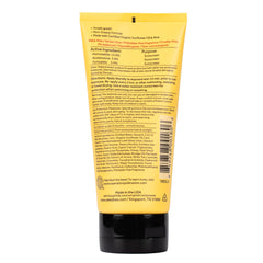 The Naked Bee sunscreen texture close-up shows smooth, lotion-like application.