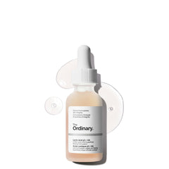 The Ordinary Lactic Acid 5% + HA bottle closeup highlights gentle exfoliation for smoother skin.