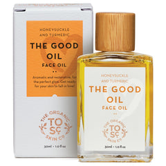 The Organic Skin Co Organic Jojoba Oil Skin Glow Serum bottle provides daily hydrating glow.