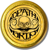 The Vintage Grooming Co. Death Grip wax tin for long-lasting hold.