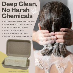 The Yellow Bird shampoo bar in hand shows its portable travel-friendly form.