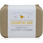 The Yellow Bird solid bar shampoo grapefruit essence closeup for refreshing scalp care.