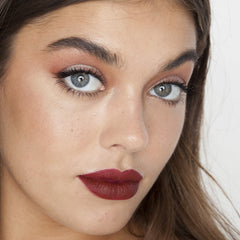theBalm Mad Lash water-resistant formula endures sweat and humidity with confident lashes.
