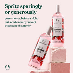 the body shop strawberry body mist misting over skin delivers a cooling sensation.