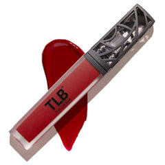 The Lip Bar Bawse Lady liquid matte bottle shows a bold blue-red shade with long-lasting wear.