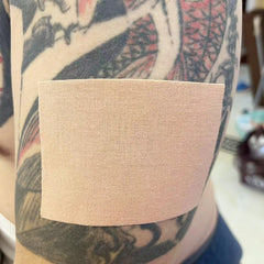 Therasports tattoo cover up tape application demonstrates easy peel and stick