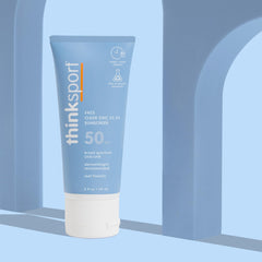 Thinksport water-resistance label shown on skin-safe mineral sunscreen during pool day
