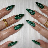 Thuoxde green press-on nails almond medium marble pack ready for an easy at-home manicure.