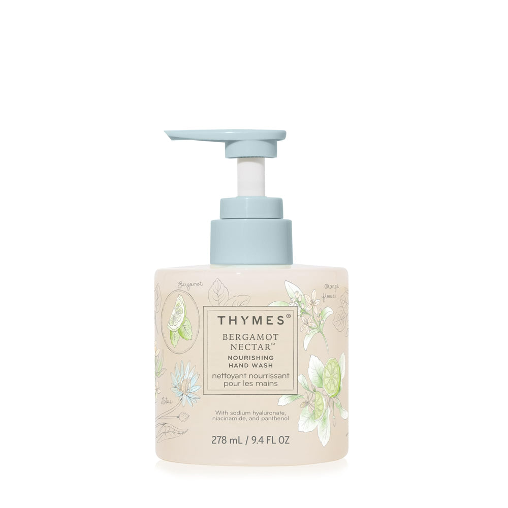 Thymes Nourishing Hand Wash bottle on sink for daily refreshing cleansing.