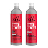 TIGI Bed Head Resurrection shampoo bottle pour showing maximum-strength repair for dry, damaged hair.