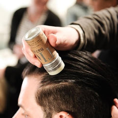 TIGI Bed Head Wax Stick used for slicked-back style with flexible, non-sticky hold.