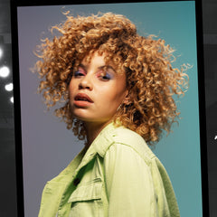 TIGI Catwalk Root Boost on wet hair prepares for blow-dry volume and texture.