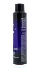 TIGI Catwalk Your Highness Foam application shows fine mist for even distribution.