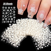 Tiwnefua white snowflake nail stickers pack close-up for quick festive manicures.