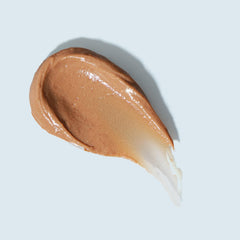 TiZO Lip Protection tinted application on lips with SPF for daily sun safety.